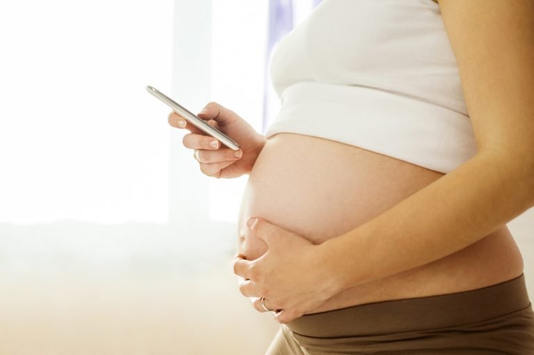Pregnant Woman with phone
